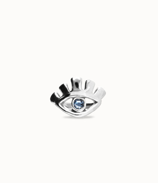 Eye-shaped ring with faceted blue crystal
