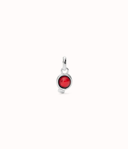 Charm with red stone
