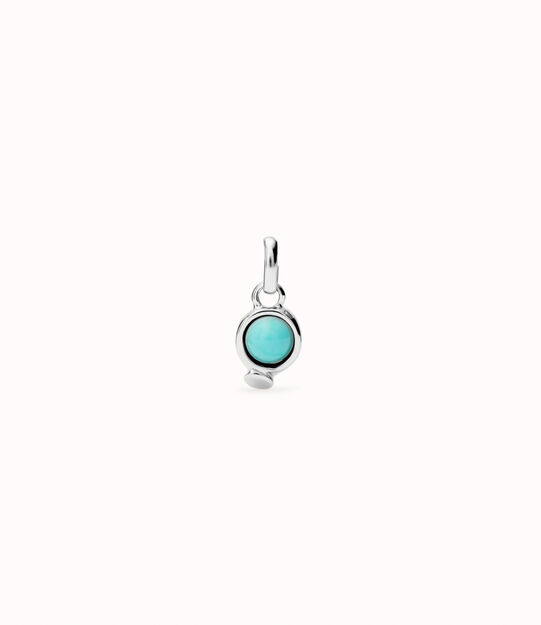Charm with red stone