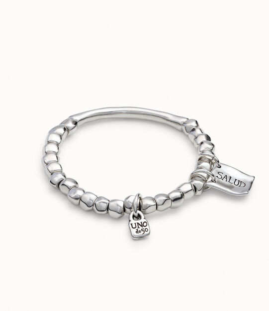 Beaded stretch bracelet with tubular piece and charms