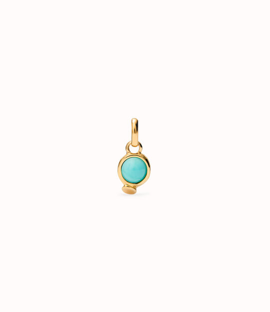 Charm with red stone